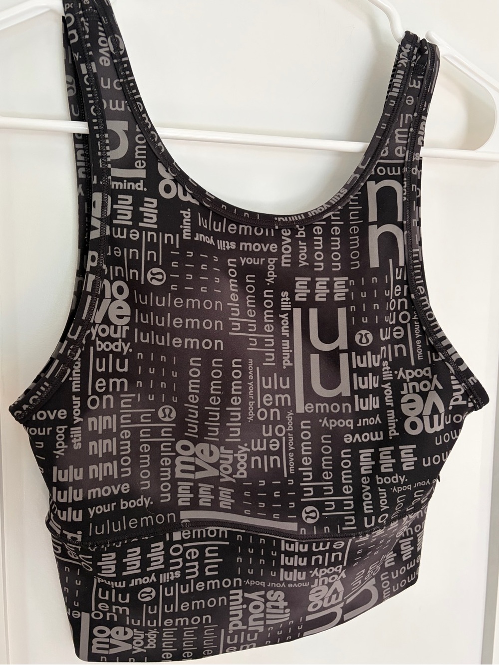 5. Size 4 LULULEMON Black Logo Power Pivot Tank